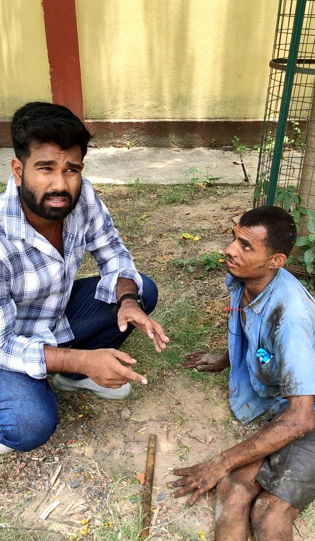 A volunteer speaking with a man in need of help