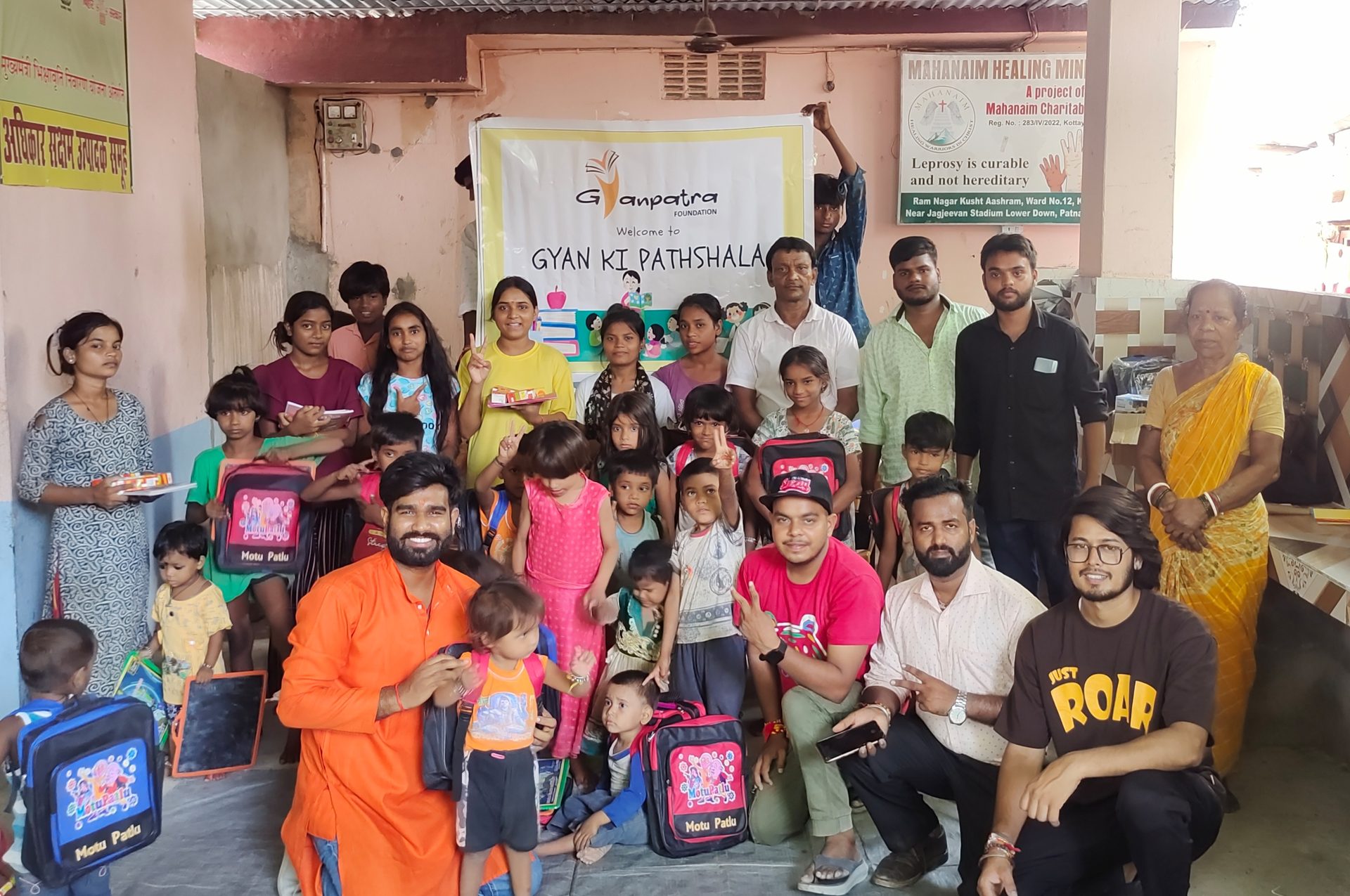 Volunteers and children together at the Gyan Ki Pathshala centre